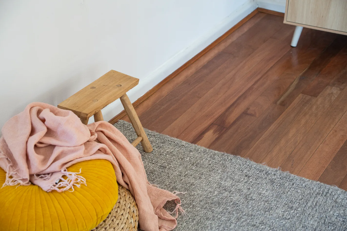 Scandinavian Interior design Concept- Wooden table & Cozy rug.