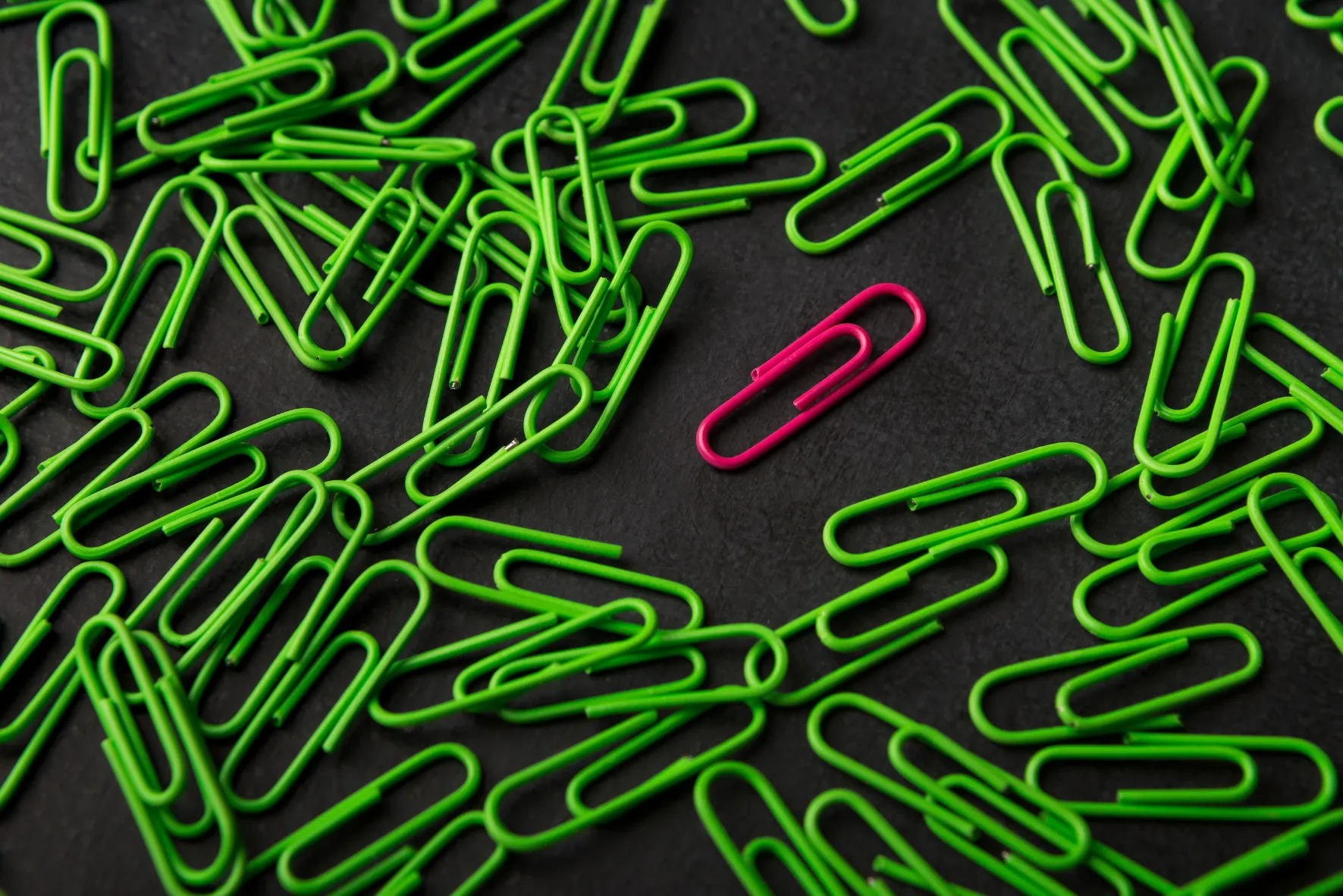 Break Interior Design Rules- Unique Red Paperclip among Green ones